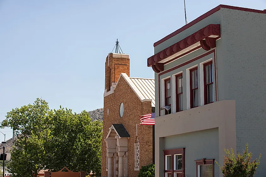 Historic church and downtown storefronts in Benson, Arizona, lit by afternoon sun