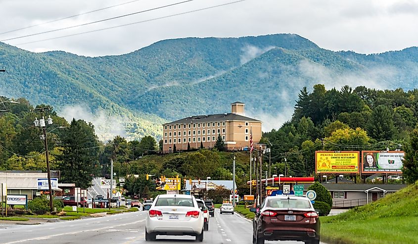 Road street leading to downtown Sylva, North Carolina with smoky mountain mist in Blue Ridge mountains cityscape at home of Southwestern Community College