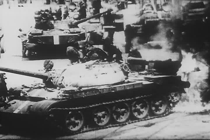 Soviet tanks marked with invasion stripes during the invasion