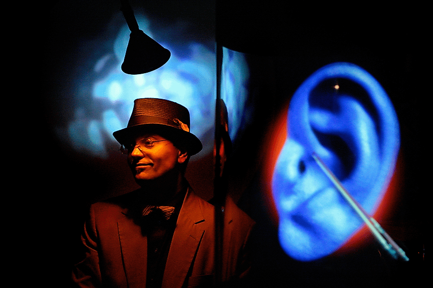 Neil Salley standing in front of Earolin inside of Musée Patamécanique museum.