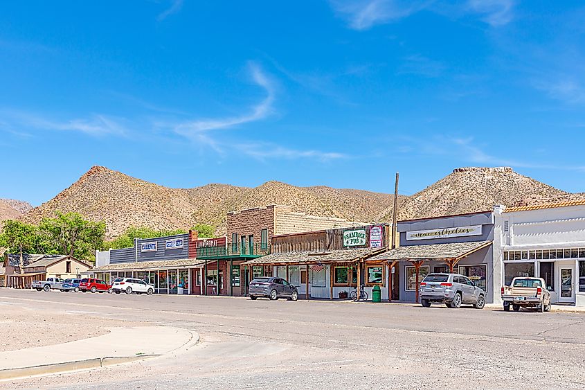 Downtown Caliente, Nevada, with small shops in midday heat.