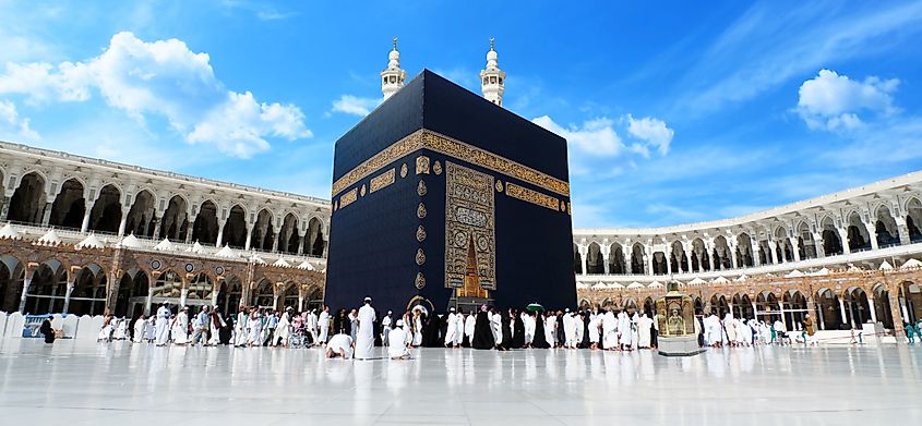 The iconic building of the Kaaba with Muslims around the world in Saudi Arabia as a place of pilgrimage. Editorial credit: Khalifah Territory / Shutterstock.comEditorial credit: Khalifah Territory / Shutterstock.com