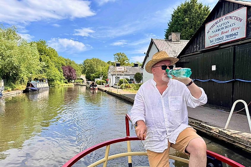 Skipper Toby takes the helm at Autherley Junction. Image credit: Bryan Dearsley