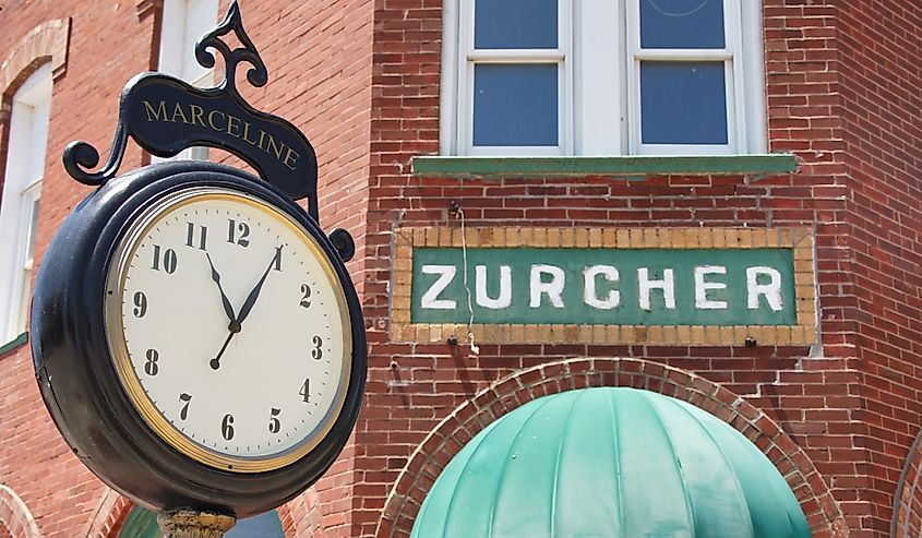 An old fashioned street clock sits on the corner in Marceline, Missouri.