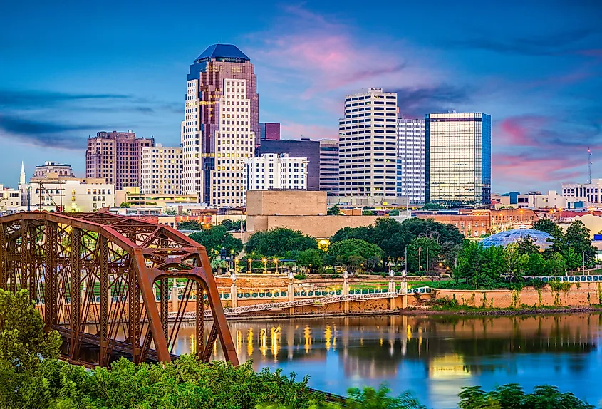 Shreveport, Louisiana, skyline over the Red River at dusk.
