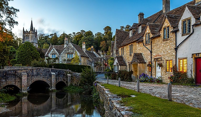 Coblestones roads and a bridge over a river in Castle Combe in Wiltshire, England