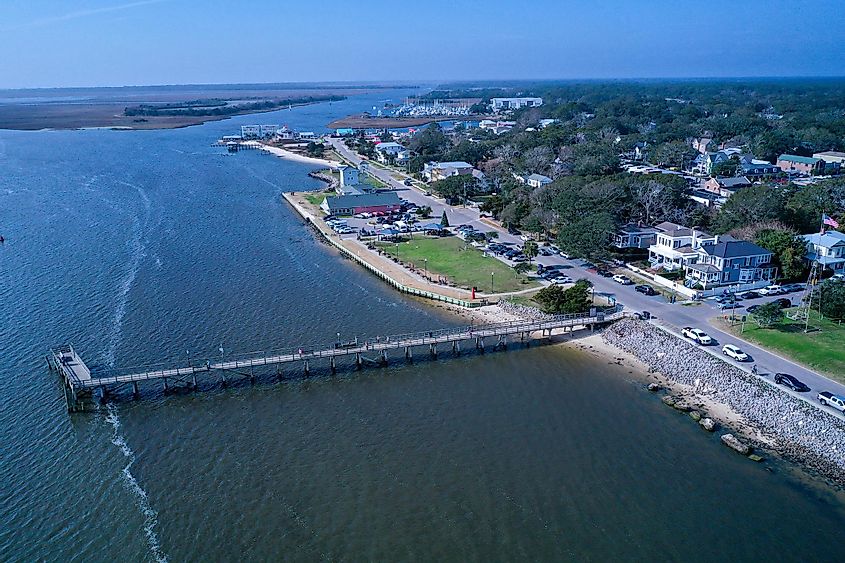 Aerial view of the town of Southport NC pier. Looking over the cape fear river at the city water front.