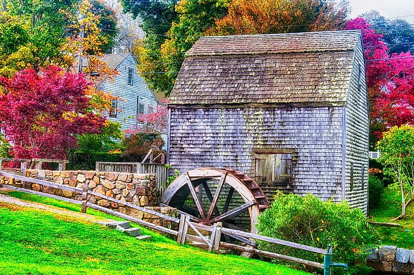 Dexter Grist Mill and water wheel landmark in Sandwich, Massachusetts, New England, during autumn.