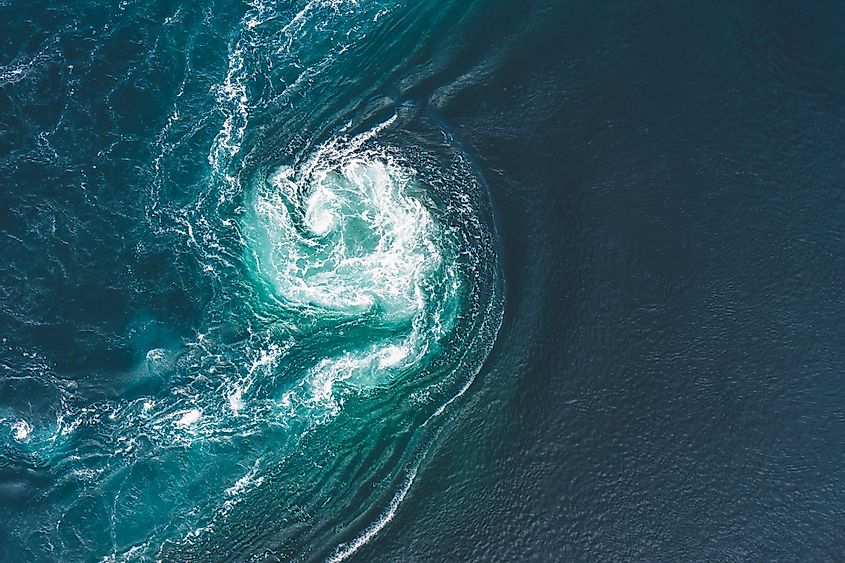 A surface ocean current creating a whirlpool.