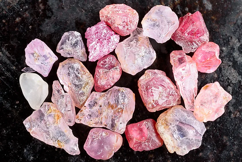 Pink and red rough uncut spinel gemstones.