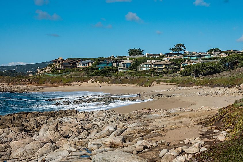 Waves break on the rocky pacific coast along the beach of central Coast of California, in Carmel by the Sea