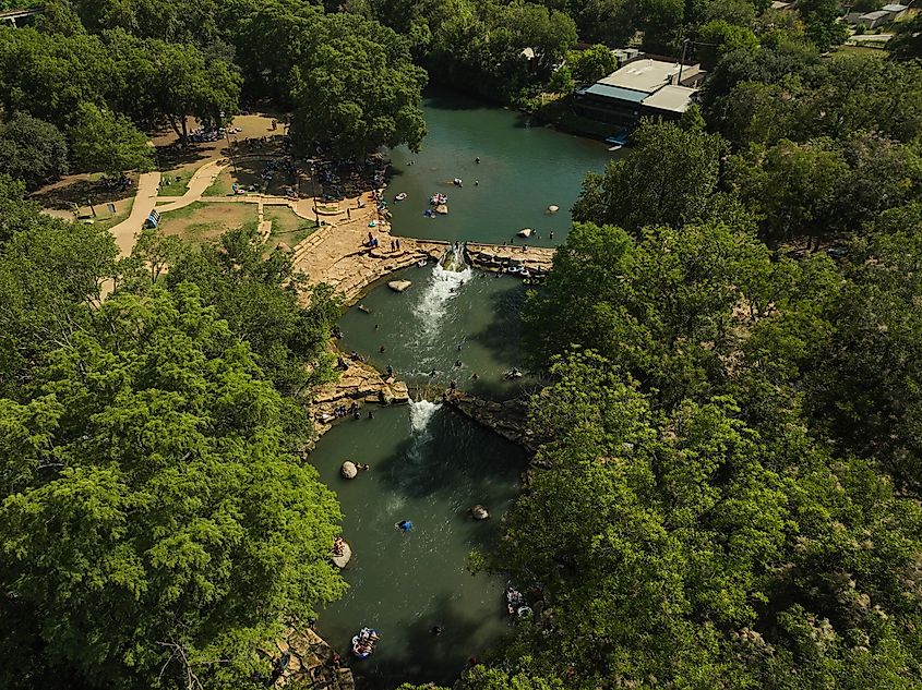 People tubing the San Marcos River in Texas