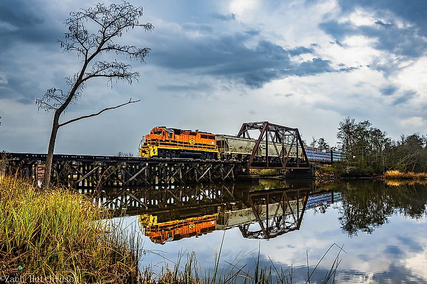 A train crosses Chickasaw Creek in Saraland, Alabama.