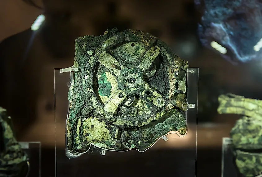 The corroded bronze fragments of the Antikythera Mechanism on museum display