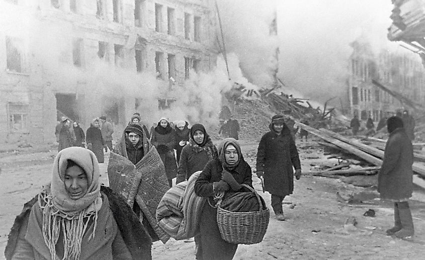 Citizens of Leningrad leaving their houses destroyed by German bombing.