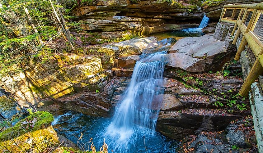 Sabbaday Falls with fall foliage on Kancamagus Highway in White Mountain National Forest, Waterville Valley, New Hampshire NH, USA.