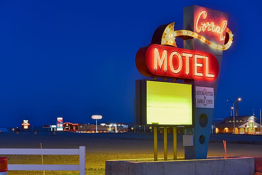 The illuminated neon sign at night for the Corral Motel in Harlowton, Montana.