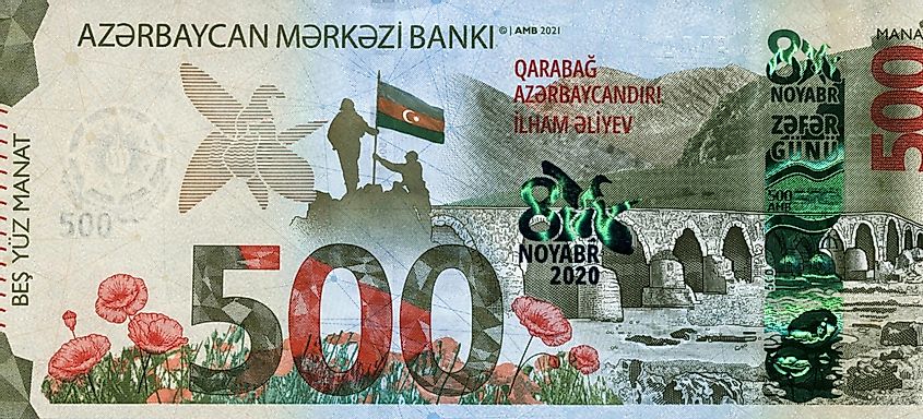 Azerbaijani soldiers holding flag, Khudafar stone bridge. Portrait from Azerbaijan 500 manats 2021 
