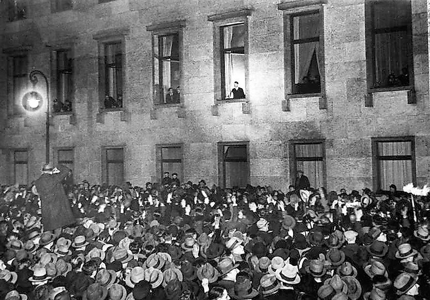 Hitler, at the window of the Reich Chancellery, receives an ovation on the evening of his inauguration as chancellor, 30 January 1933.