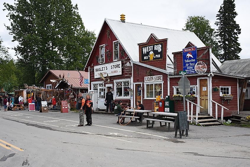 Facade of stores and pubs in the small old town of Talkeetna
