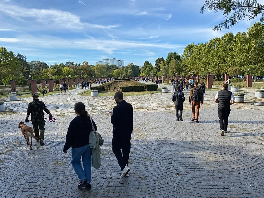 A cobblestone circuit within a large Eastern European city park.