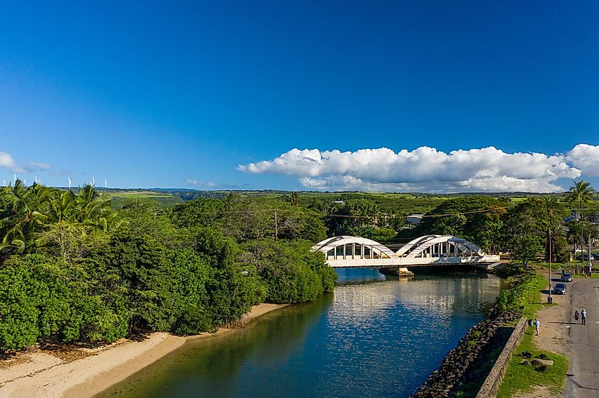 Aerial shot of the river anahulu and the twin arched road bridge in the North Shore town of Haleiwa