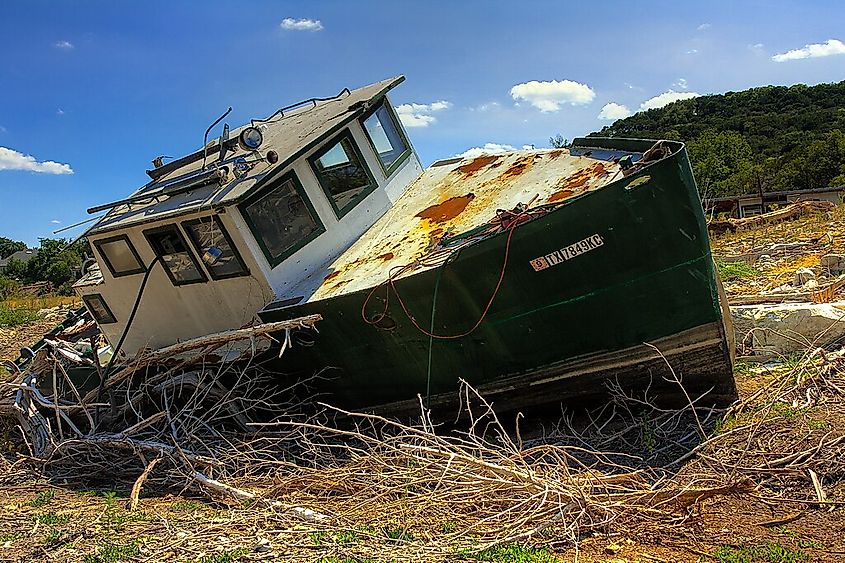 This boat was left to sit in the middle of what is normally a branch of Lake Travis, part of the Colorado River.