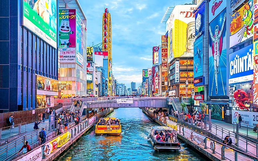 Tourists at Dotonbori shopping street, Dotonbori is the famous destination for traveling and shopping in Osaka, Japan.