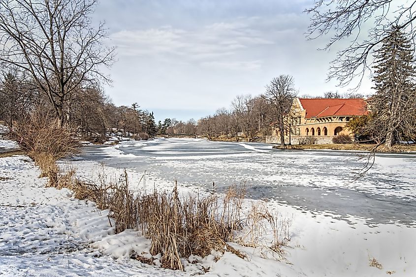 Snow and ice cover the lake in Washington Park, Albany, New York