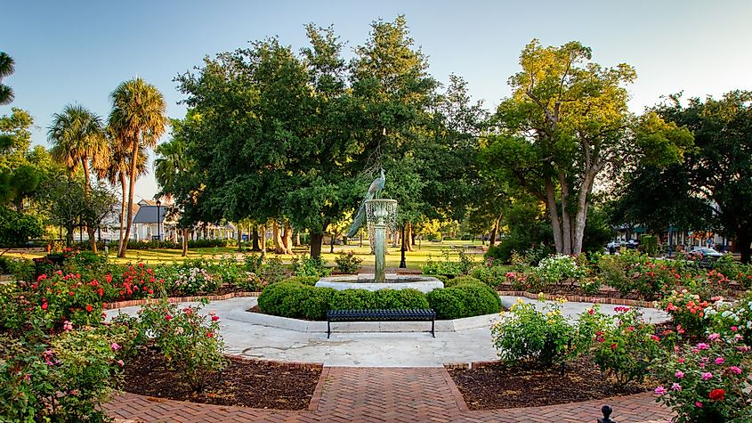 Winter Park Florida, a suburb of greater Orlando. Central park rose garden with fountain.