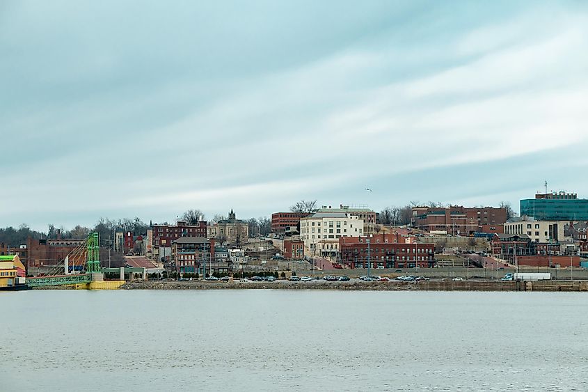 Cityscape of historic Alton, Illinois sprawled across the bluffs along the Mississippi River