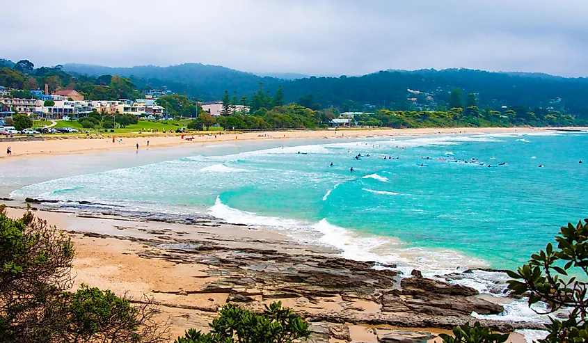 People in the water at Lorne beach on Great Ocean Road, Victoria state, Australia