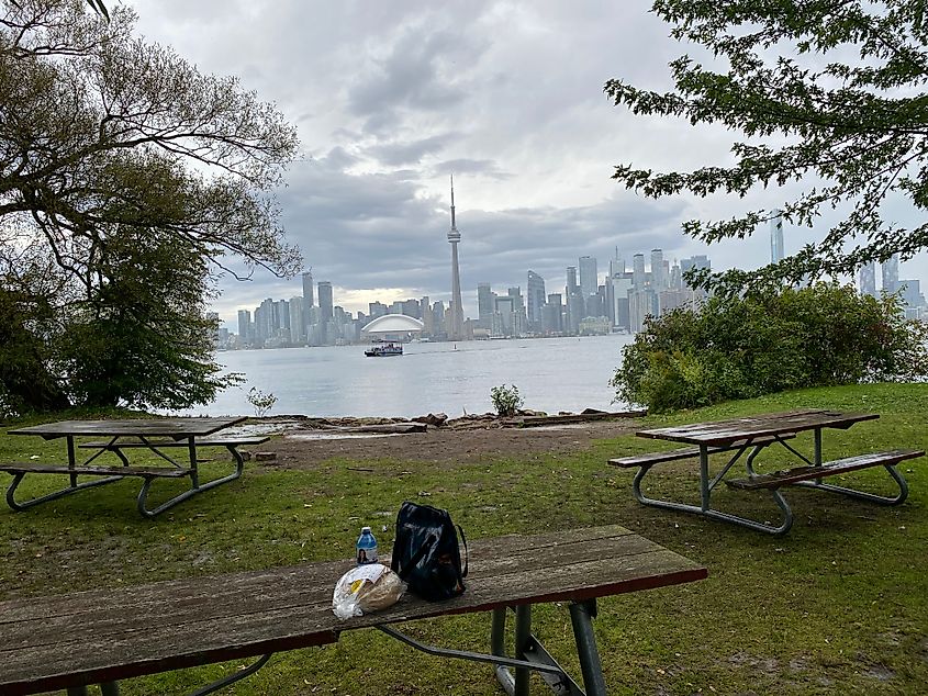 A small picnic set up on an overcast day, facing Toronto's skyline across the water.