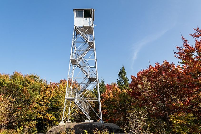 Mt Arab fire tower in Adirondacks surrounded by fall foliage