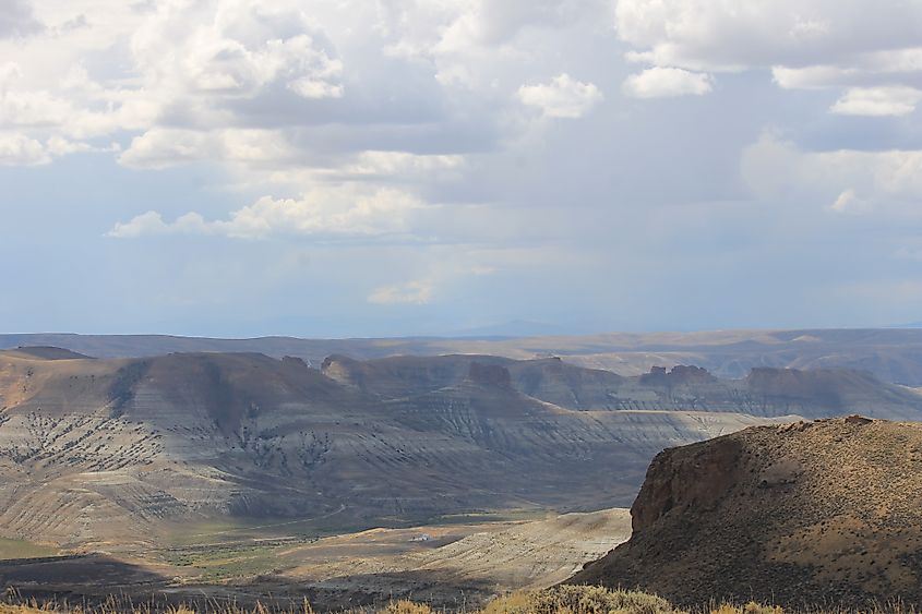 Thunderstorm clouds gather above the hills of the Wild Horse Loop in Sweetwater County, WY. 