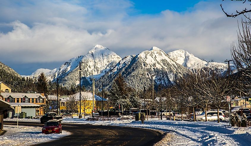 Downtown Sitka Alaska, winter season. Small town with beautiful snowy mountains in background.