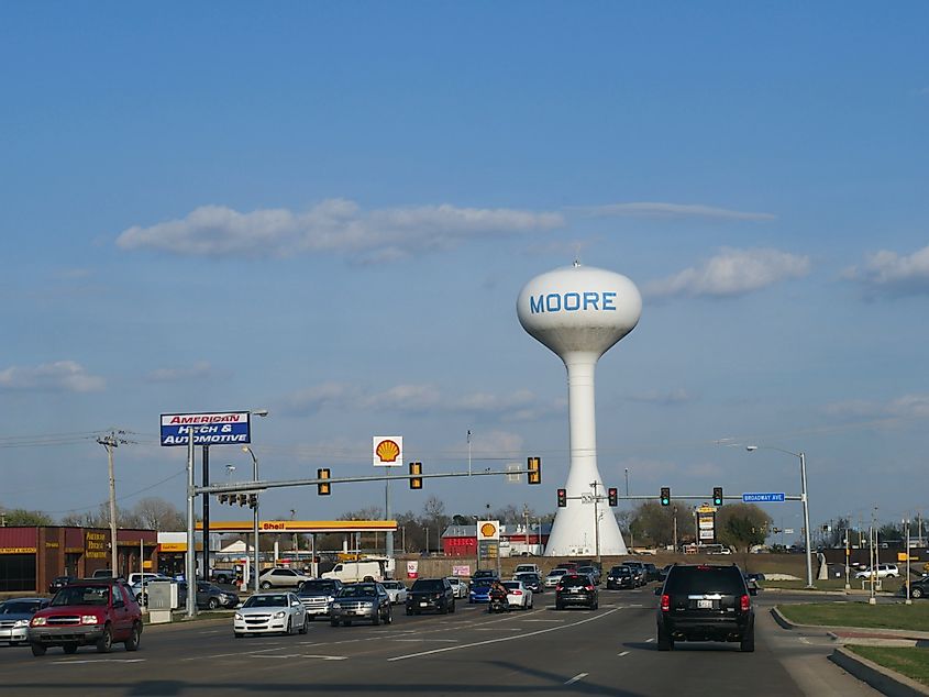 Late afternoon traffic with the giant water tank in Moore, Oklahoma.