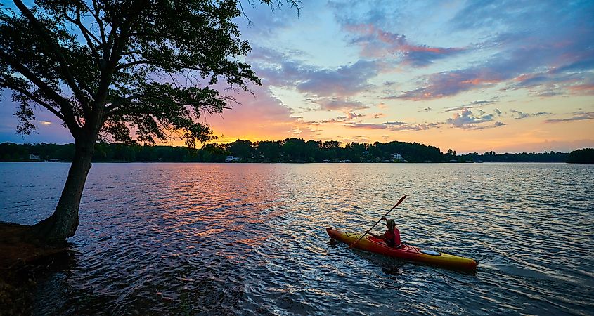 Kayaker on Lake Keowee at Sunset.