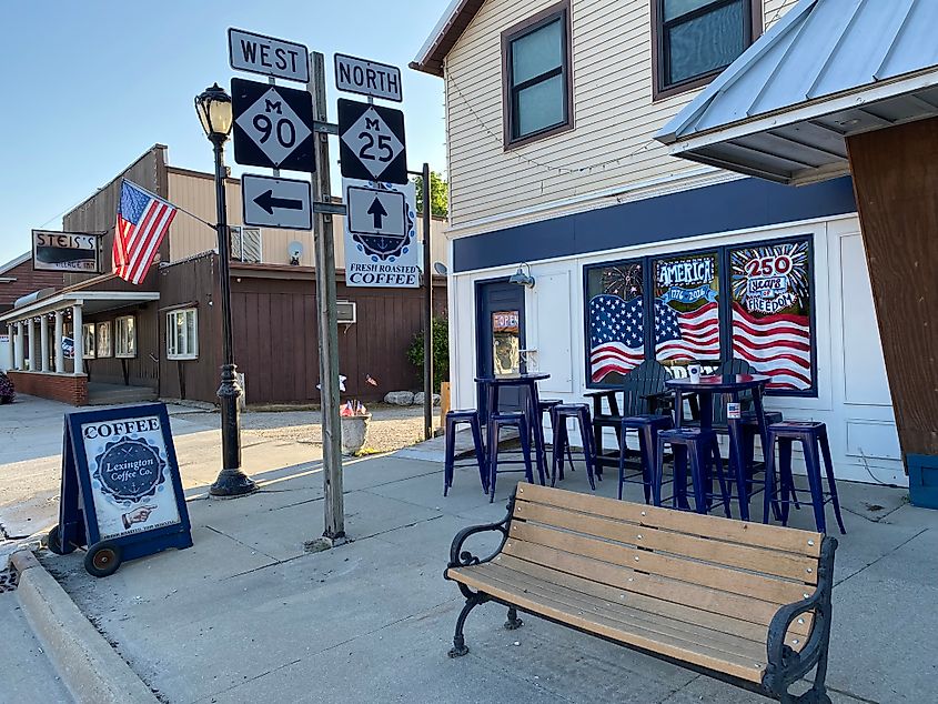 A coffee shop with decorations for America's 250th anniversary stands at the crux of two minor Michigan highways.