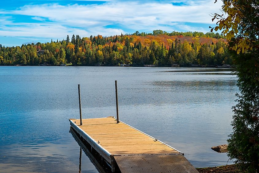 Colorful autumn foliage over Caribou Lake in northern Minnesota.