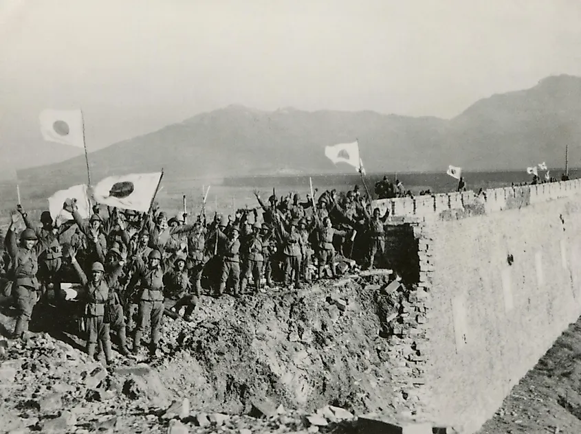 Japanese soldiers celebrate the capture of Nanking, China.