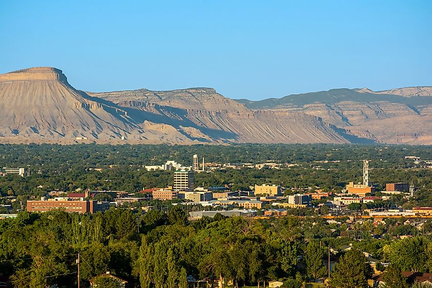 The cityscape of Grand Junction, Colorado, with the mountains forming the backdrop