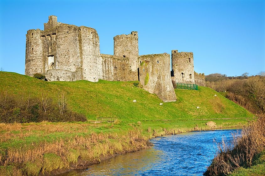 Kidwelly Castle rises above the town of Kidwelly, Wales.