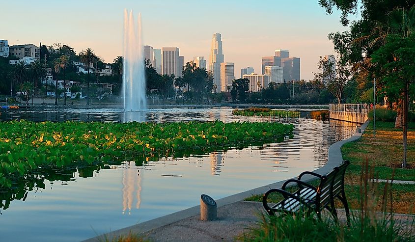 Los Angeles downtown view from park with urban architectures and fountain.