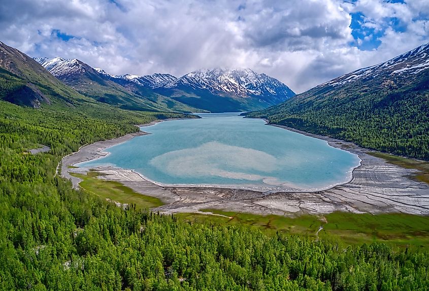 Aerial view of Eklutna Lake between mountains in Chugach State Park, Alaska
