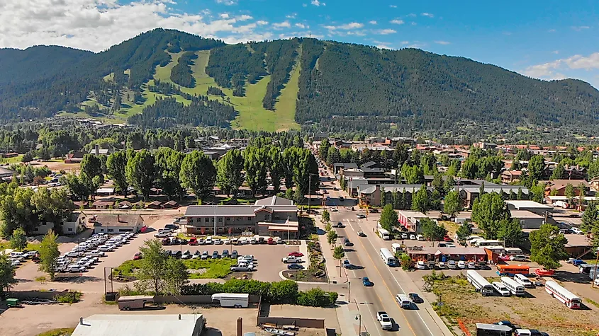 Panoramic aerial view of Jackson Hole homes and beautiful mountains on a summer morning, Wyoming.