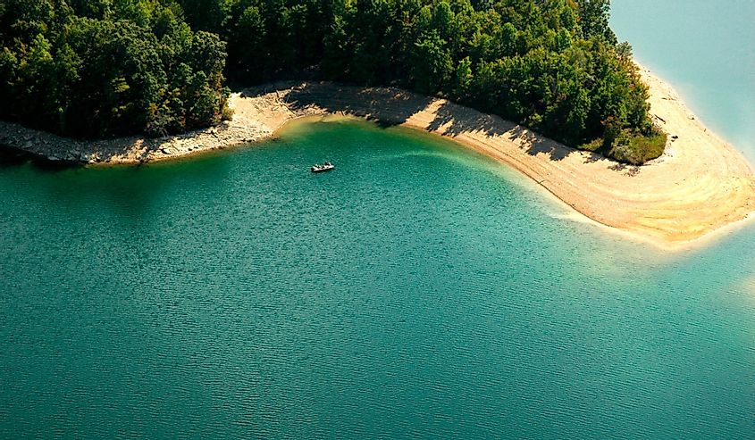 Aerial view, Summersville Lake with a boat on the turquoise waters