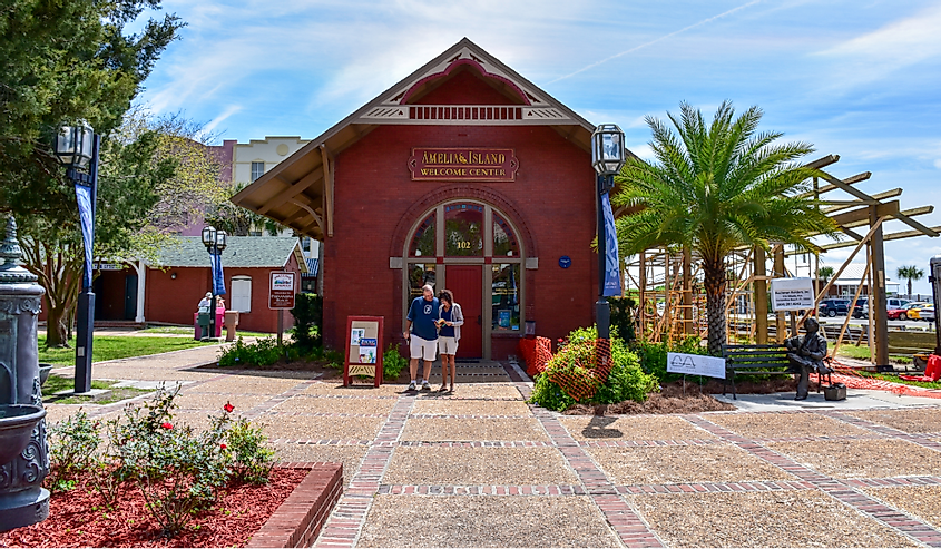 A couple standing in front of the Welcome Center at Amelia Island, Florida, set off to explore the town.