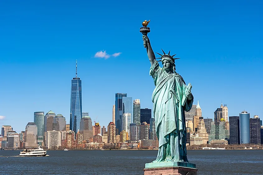 The Statue of Liberty over the Scene of New York