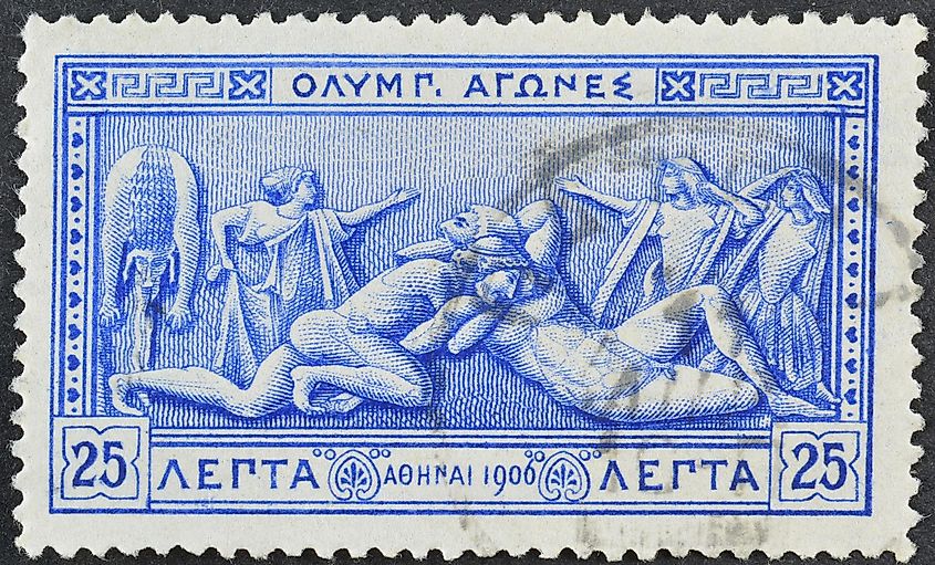 Cancelled postage stamp printed by Greece, that shows Hercules wrestling Antaeus. Image by ilapinto via Shutterstock